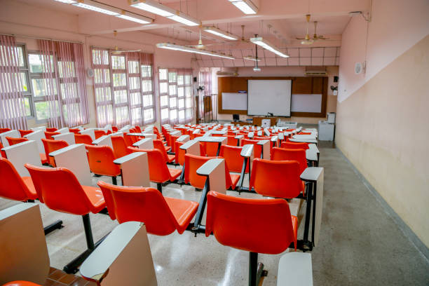 istock Roll of chairs in classroom. 1408851720