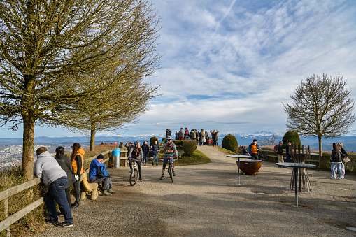 Uetliberg, Switzerland - February 16, 2020: People ejoying their time on observation platform on top of Uetliberg in Switzerland during February 2020