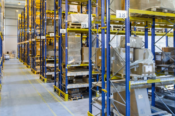 istock Interior of a modern warehouse storage with rows and goods boxes on high shelves 1408855203