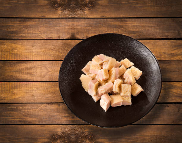 istock Chopped raw tripe on the plate - Rustic wooden background 1408861551
