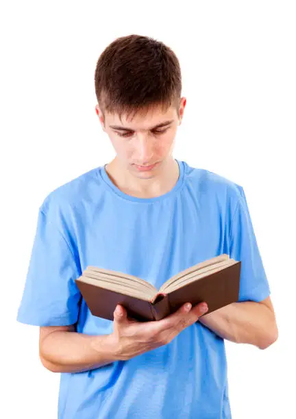 Young Man read a Book Isolated on the White Background