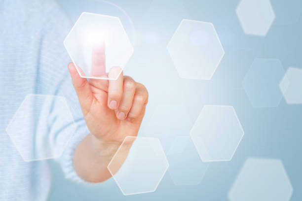 istock Female hand touching a holographic screen icon. Future technologies and science. 1408869439