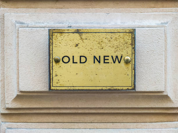 istock Sign on rough wall with the inscription Old New. 1408869772