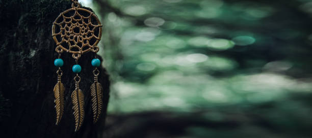 istock amulet lying on a moss on a dark natural background. pagan wiccan, slavic traditions. Witchcraft, esoteric spiritual ritual. soft focus 1408871054
