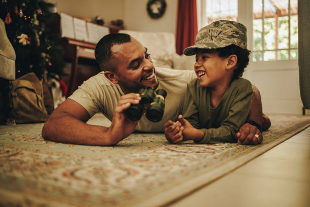 istock Father and son bonding at Christmas 1408874734