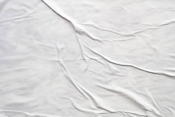 istock white crumpled and creased paper poster texture background 1408882517