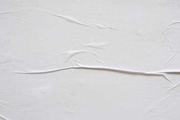 istock white crumpled and creased paper poster texture background 1408882522