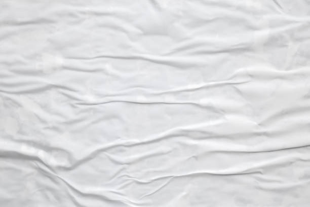 istock white crumpled and creased paper poster texture background 1408882584