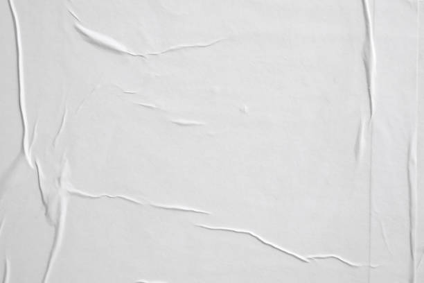 istock white crumpled and creased paper poster texture background 1408882599