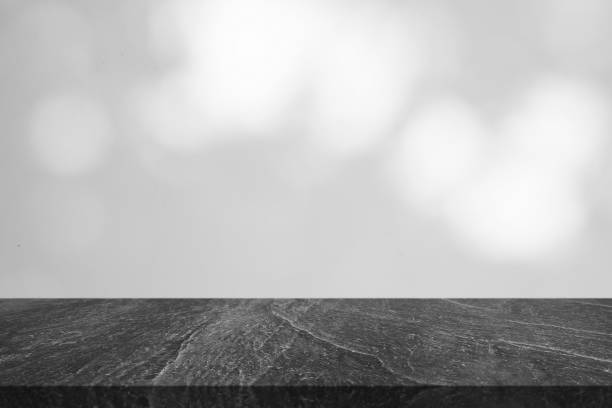 istock Marble table top with tree shadow drop on white wall background for mockup product display 1408882601