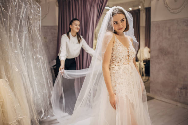 istock Bride trying on a wedding dress 1408882848