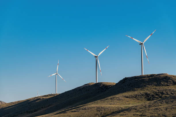 istock clean electricity producing wind turbine or windmill built on a windy mountain ridge 1408883179