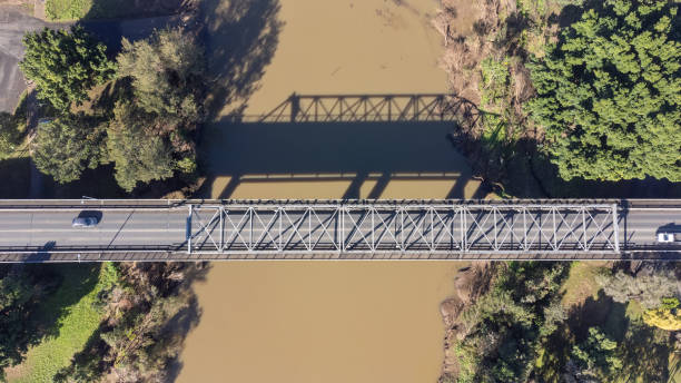 istock Bridge over the flooded muddy river through Lismore, NSW 1408884982