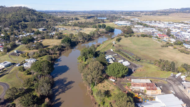 istock Industrial buildings and a river 1408884985