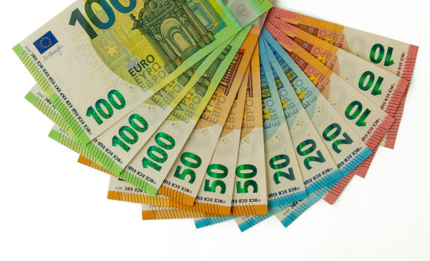 istock Sseries of euro banknotes against a white background 1408891575