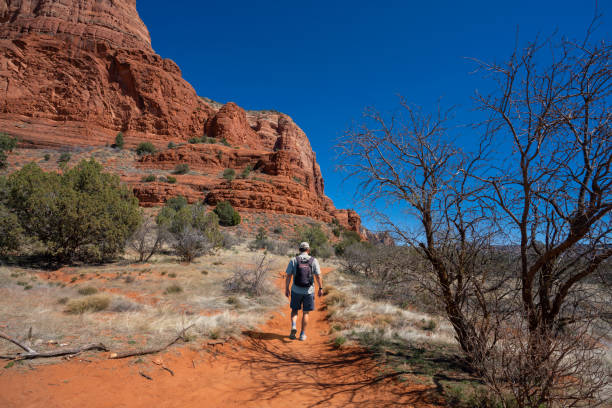 istock Man on spring hiking trip Sedona area. 1408893404
