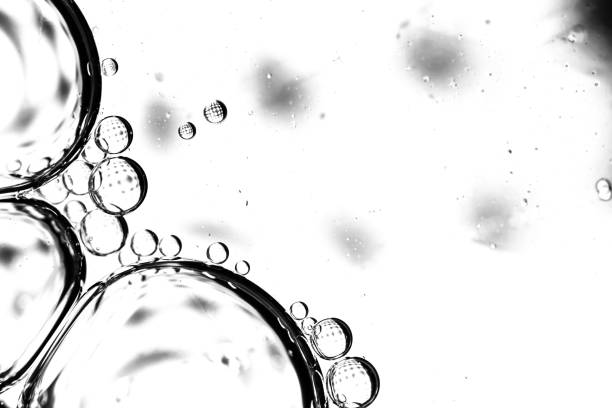 istock Abstract backdrop with oil drops and waves on water surface 1408893900