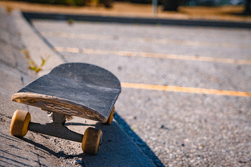 Skateboard in a Parking Lot