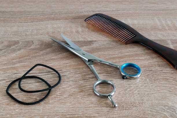 istock Scissors and comb for cutting hair at home 1408902711