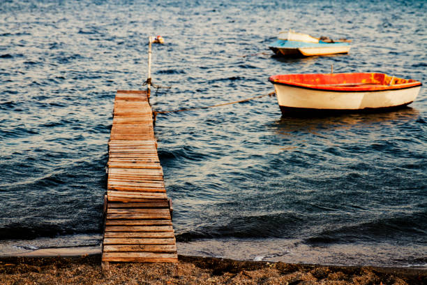 Boats By The Small Pier