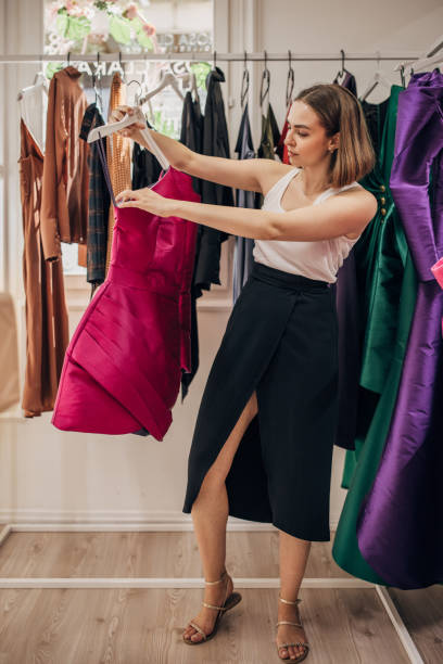 istock Woman looking to buy a dress 1408913402