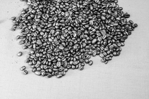 Black coffee cup, coffee beans. Breakfast coffee concept
