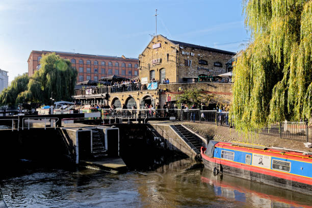 London, UK: October 31ts, 2015: Camden Town Canals. The busy colourful shops in Camden are one of the most popular places in London among locals and tourists.