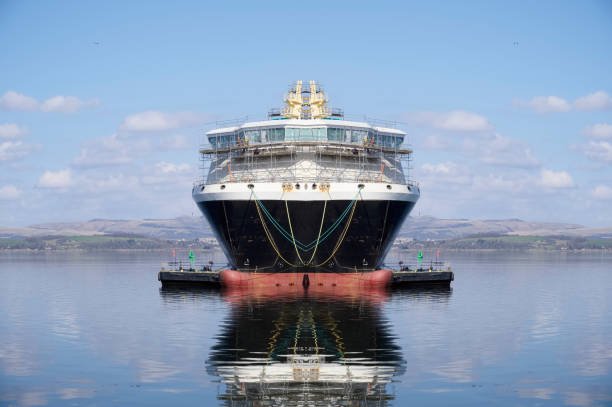 istock Ferry reflection in calm water during construction in Port Glasgow 1408930486