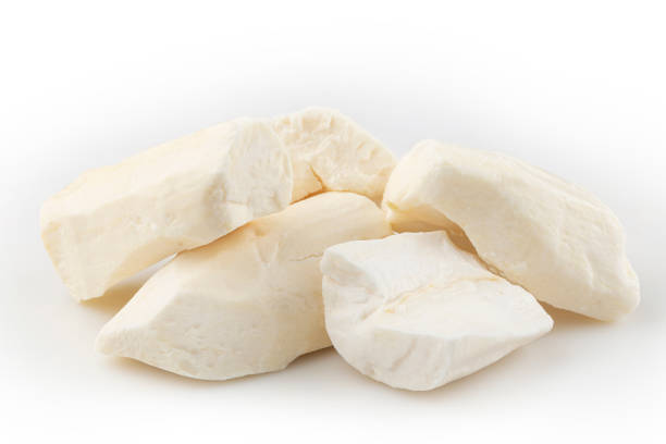 istock Peeled raw cassava isolated on white background. 1408931950