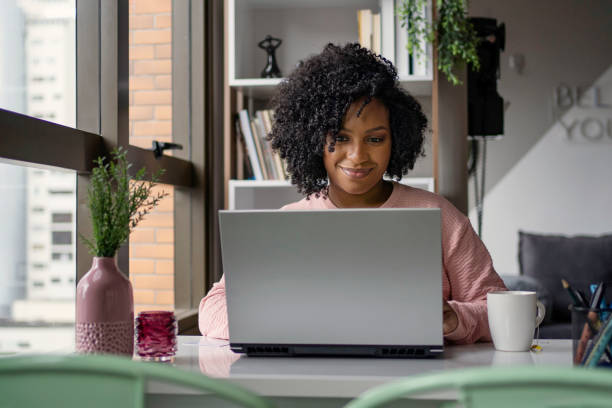 istock Young woman studying at home. Online learning concept. 1408933859