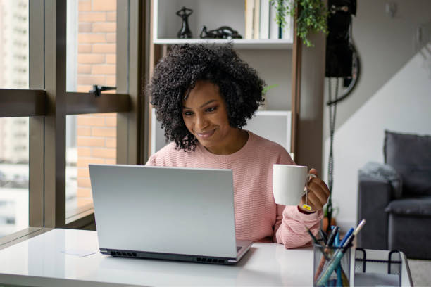 istock Young woman studying at home. Online learning concept. 1408933861