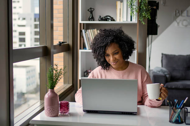 istock Young woman studying at home. Online learning concept. 1408933862