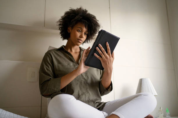 istock Young woman studying at home. Online learning concept. 1408933869