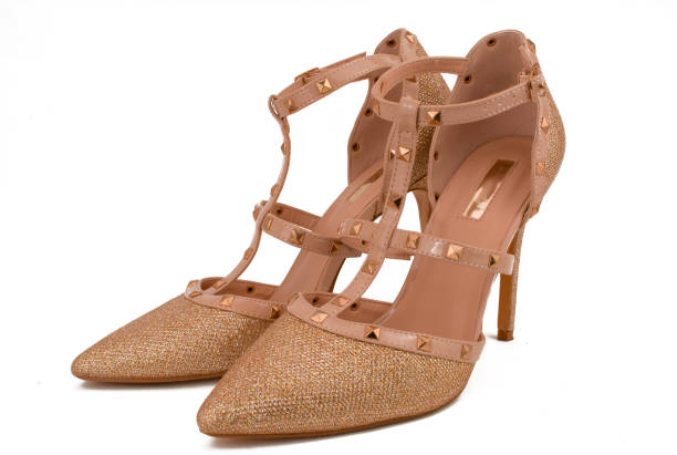 istock Luxury gold shoes on white 1408937434