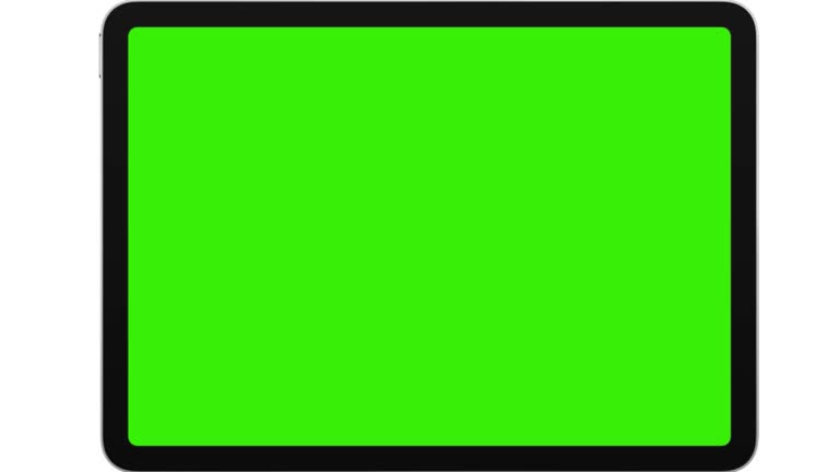 Tablet Computer With Rotation Green Screen and Motion Zoom Effect Isolated on White Background