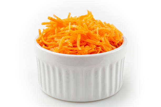 istock Grated carrot isolated on white background. 1408949341