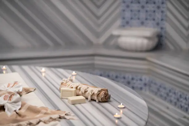 Foam massage and scrub in traditional Turkish bath