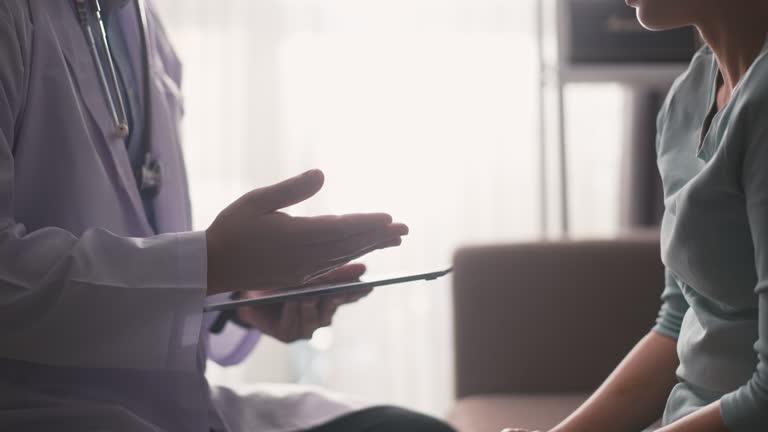 Doctor talking to patient