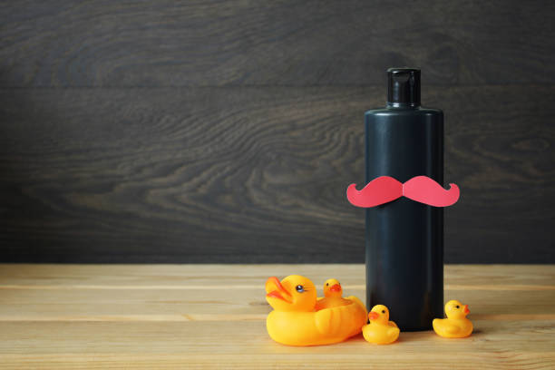 istock Men's shampoo with moustaches and rubber ducklings. 1408959300