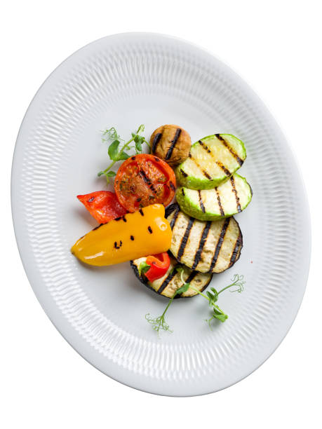 istock grilled vegetables on a white plate top view isolated on white background top view 1408960358