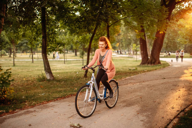 istock Riding bicycle in public park 1408965845