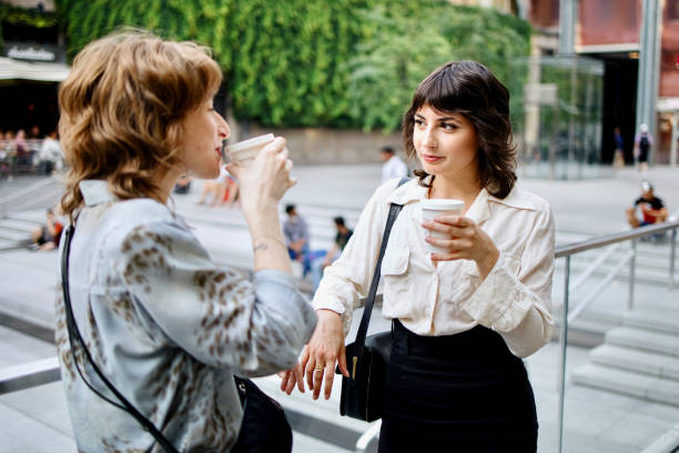 istock Two young businesswomen on a coffee break 1408974498