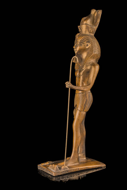 istock Ancient Egyptian statue on the black background 1408974662