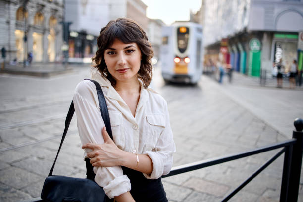 istock Young beautiful woman looking at the camera 1408974806