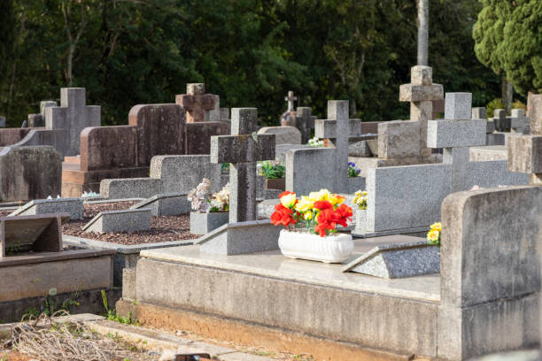 istock Ancient cemetery tombstones 1408976617