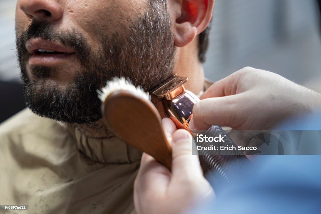 Man shaving at barbershop, Novo Hamburgo Man shaving at barbershop, Novo Hamburgo, RS, Brazil 45-49 Years Stock Photo