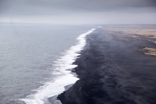 istock Reynisfjara Black Sand Beach on a dark moody day 1408978916