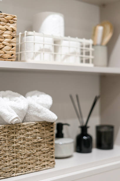 istock Clean bath towels on shelf in open closet storage 1408980045