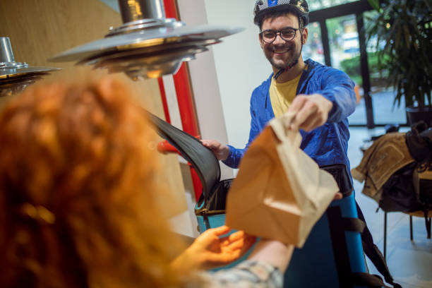 Picking up food orders at the restaurant is in progress. stock photo