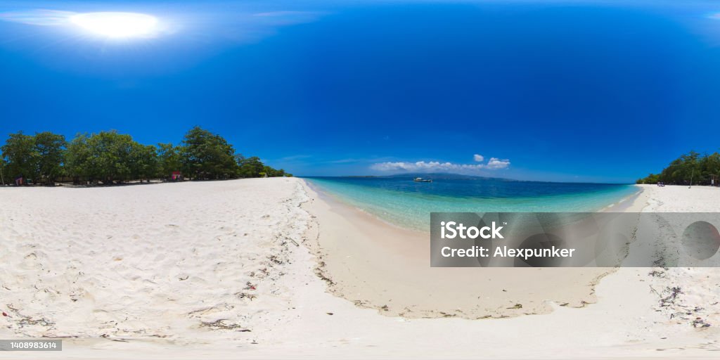 Great Santa Cruz Island. Philippines, Zamboanga. 360VR Video. Tropical landscape: small island with beautiful beach, palm trees by turquoise water view from above. Great Santa Cruz island. Zamboanga, Mindanao, Philippines. 360-Degree View Stock Photo